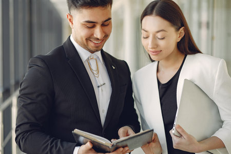 Businessman with his partner working in a office