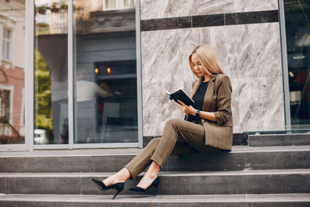 Elegant businesswoman working in a cityの写真素材