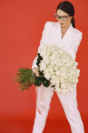 Fashion girl posing in a photo studioの写真素材