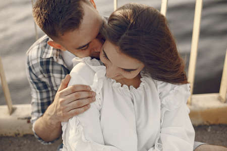 Beautiful couple spend time by the waterの写真素材