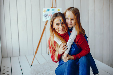 Mom and daughter are drawing