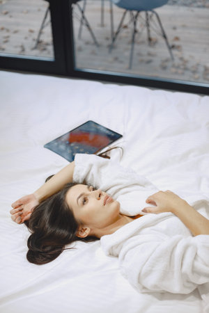 Picture of beautiful woman in white bathrobe