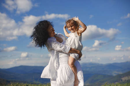 Grandmother and daughter and mountain viewsの写真素材