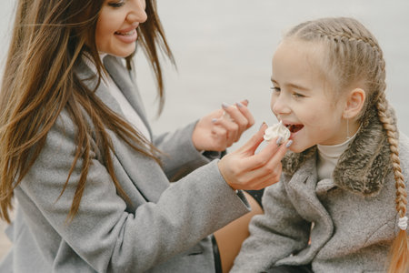 Cute and stylish family in a autumn parkの写真素材