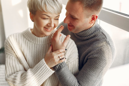 Beautiful couple spend time in a bathroom