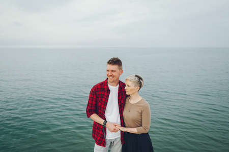 happy couple near Michigan lakeの写真素材