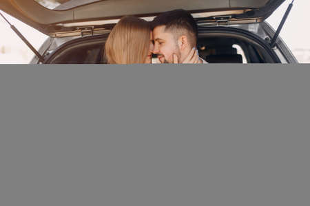 Beautiful couple spend time in a summer parkの写真素材