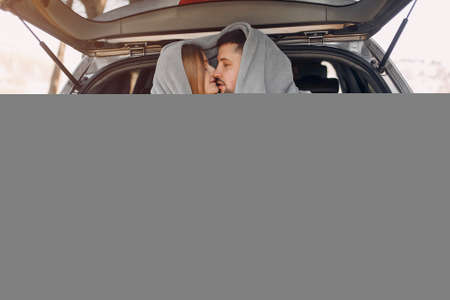 Beautiful couple spend time in a summer parkの写真素材