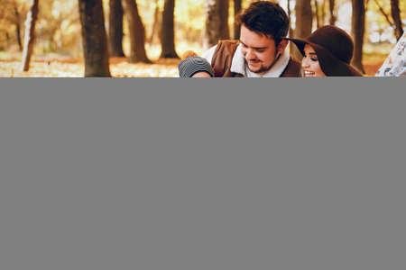 Beautiful and stylish family in a parkの写真素材