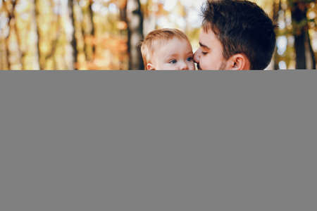 Beautiful and stylish family in a parkの写真素材