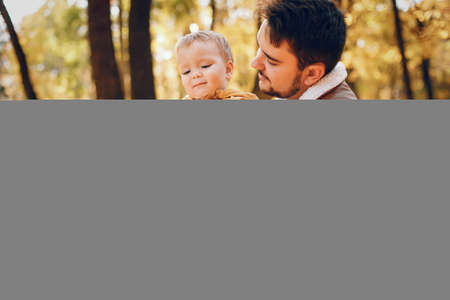 Beautiful and stylish family in a parkの写真素材