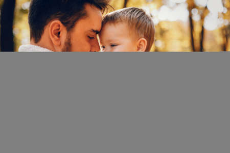 Beautiful and stylish family in a parkの写真素材