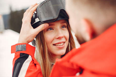 Winter snow couple in a mountainsの写真素材