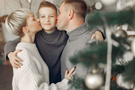 People in a winter clothes in a christmass atmosphereの写真素材