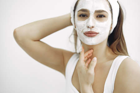 Woman standing in a cosmetology studioの写真素材