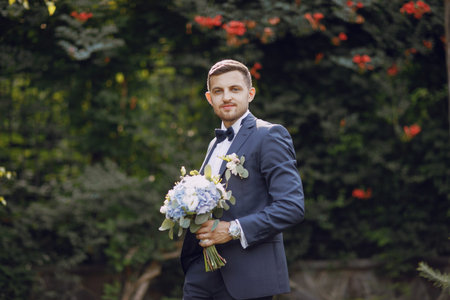 groom in a park