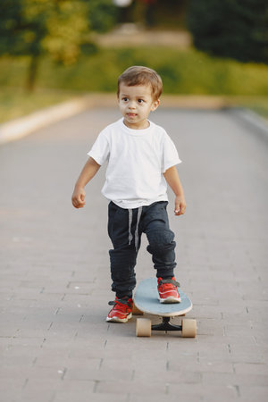 Cute little boy have fun on a playgroundの写真素材