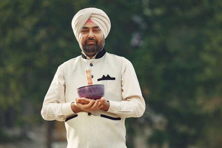 Portrait of Indian sikh man in turban with bushy beardの写真素材