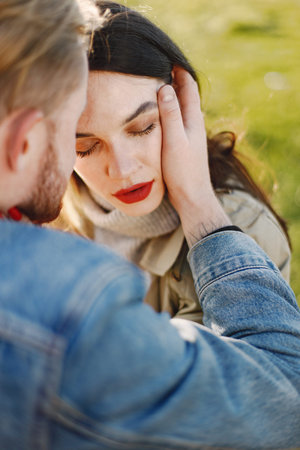 Cropped portrait of a stylish romantic couple on a nature