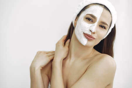 Woman standing in a cosmetology studioの写真素材