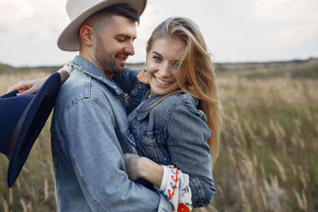 Very beautiful couple in a wheat fieldの写真素材