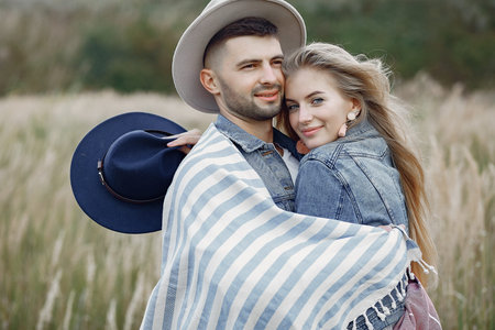 Very beautiful couple in a wheat field