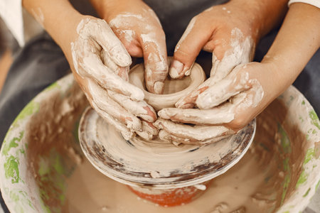 Young couple at artwork in pottery