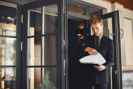 Handsome man in black business suit.
