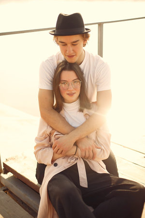 Beautiful couple spend time on a summer park