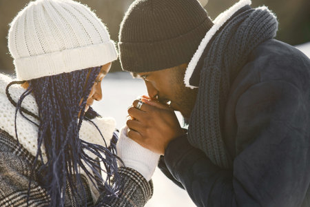 African american couple in a winter forest