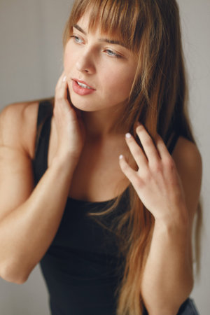 Fashion girl posing in a photo studio
