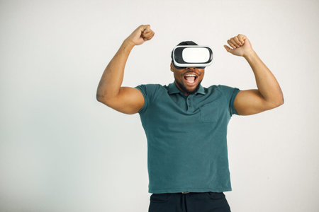 Black guy with virtual reality glasses isolated on white background
