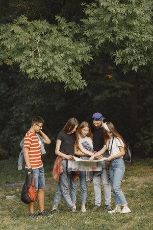 Groups of friends camping in the forest