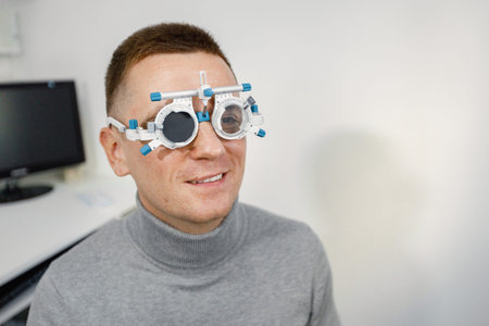 Man doing eye test checking examination at ophthalmology center