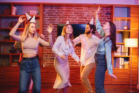 Friends standing together, under a confetti and celebrating birthday