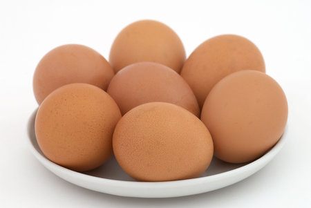 Brown eggs on the background. Selective focus