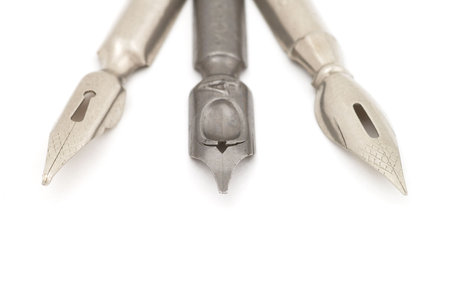 Old silver and steel fountain pens. Selective focusの写真素材