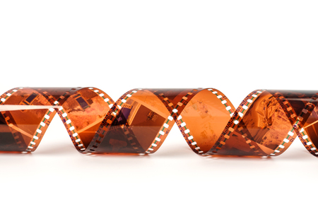 35mm photo film. Old photo film negative isolated on white. Photographic film strip isolated on white backgroundの写真素材