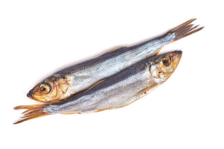 Smoked fish Baltic herring isolated on white background.の写真素材