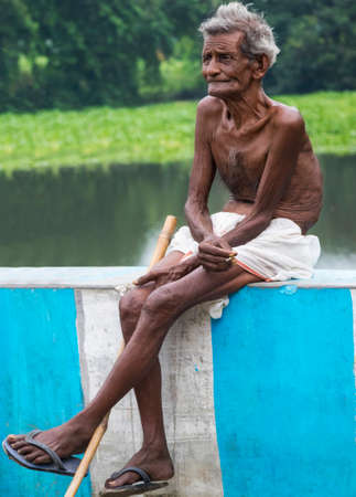 indian old man smokingのeditorial素材