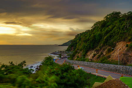 Sunset beautiful curved road of the sea at Noen Nangphaya view point in Kung Wiman, Chanthaburi, Thailand.の写真素材