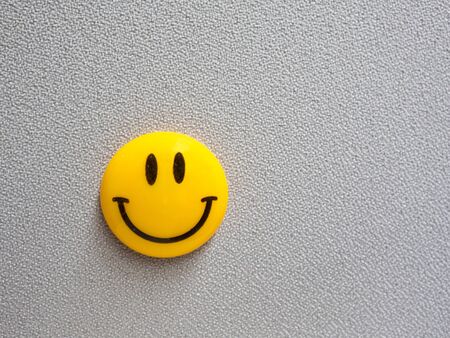 happy yellow stuck on the paint flapの写真素材