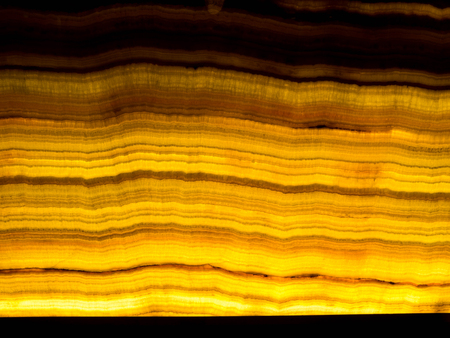 Patterns of marble walls. With lights in the background Black and gold stripesの写真素材