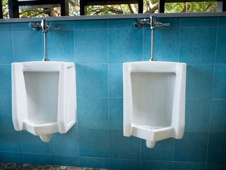 toilet men's room.Close up row of outdoor urinals men public toilet, Urinals in the men's bathroom urinals designの写真素材