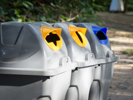 Gray bins for waste sorting are in the public park in bangkok thailand. recycle conceptの写真素材