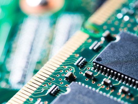 close-up of circuit board with integrated circuits, resistors and capacitors.