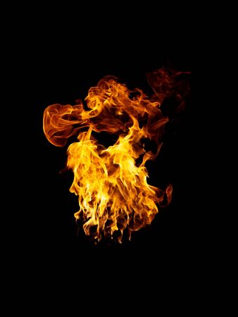 real and hot flames are burning on a black background.の写真素材