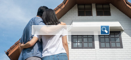 Searching browsing internet bar over background is Happy couple in front of the New Home On Moving In Day. Searching Browsing Internet Data Information Networking Conceptの写真素材