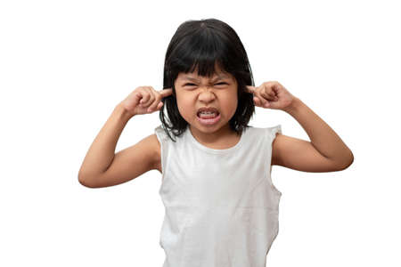 Portrait of angry emotional Asian girl screaming and frustrated shouting with anger, crazy and yelling and hand cover ears on white background, Attention deficit hyperactivity disorder (ADHD) conceptの写真素材