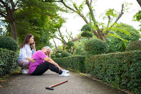 Asian senior woman fell down on lying floor because faint and limb weakness and pain from accident...